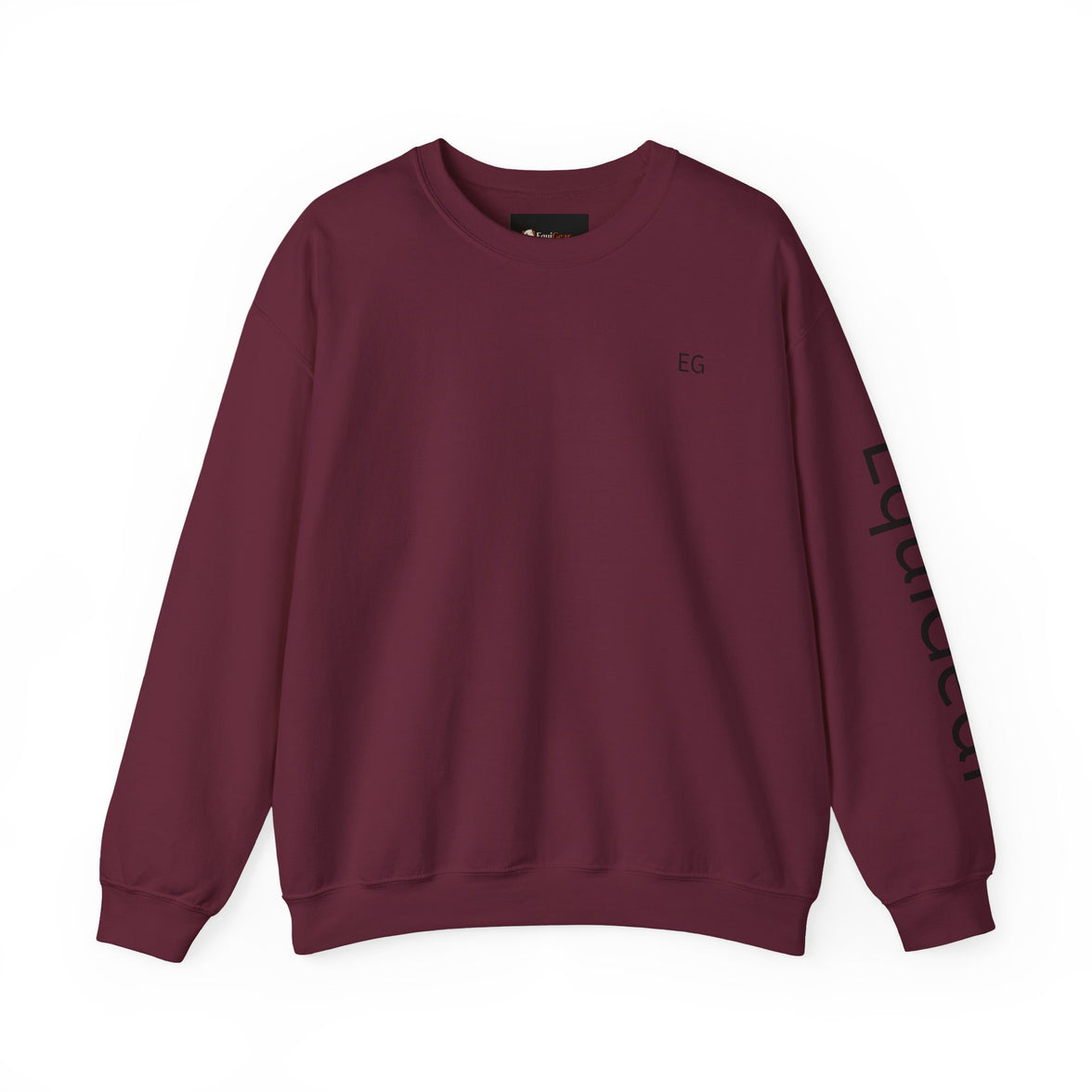 Unisex heavy blend crewneck sweatshirt in maroon color with ribbed collar and soft fabric.